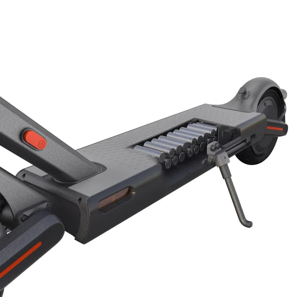 Close-up of a black scooter with visible components on a white background