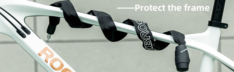 Bicycle frame with protective straps and 'Rogue' branding on a light gray background.