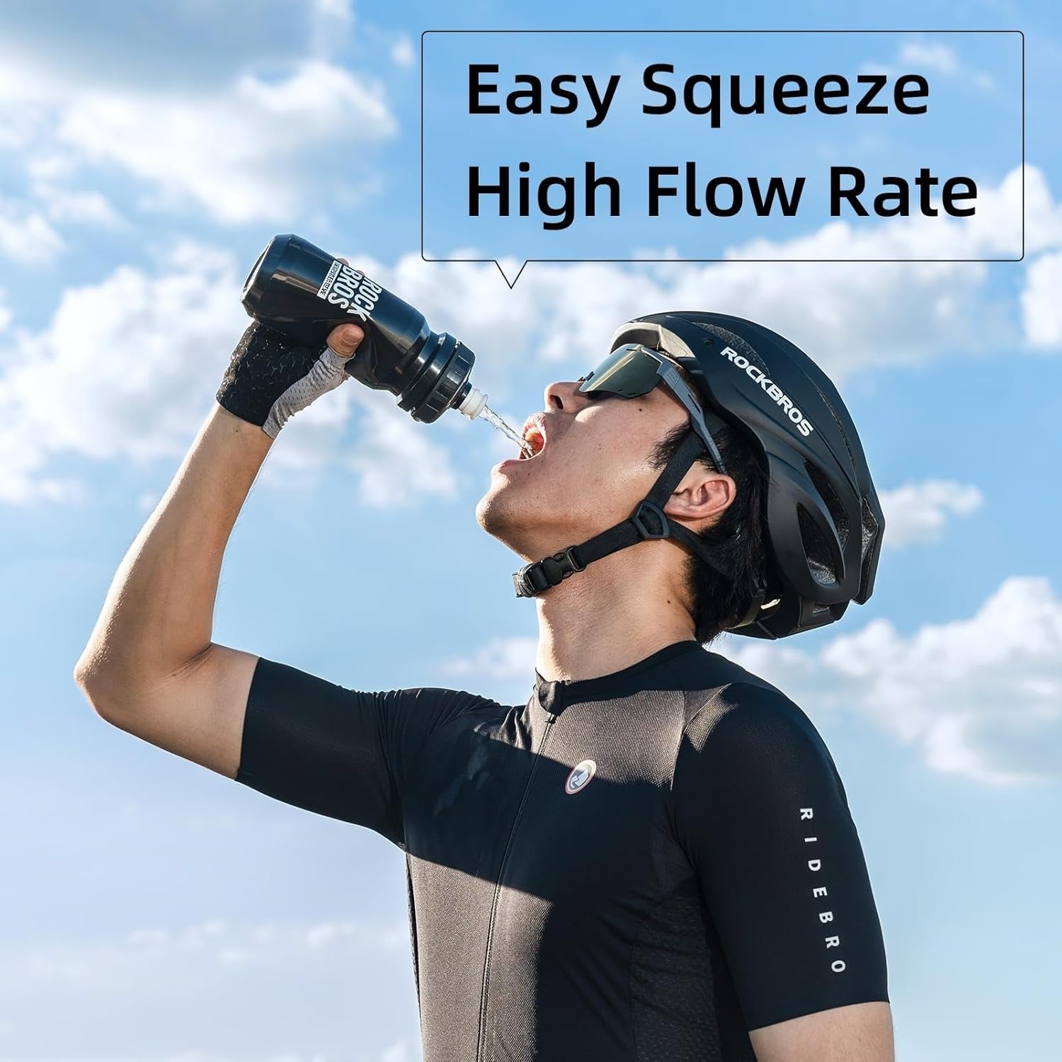 Person in cycling gear drinking from a water bottle with text 'Easy Squeeze High Flow Rate' against a blue sky.