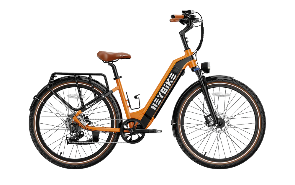 Orange electric bike with black frame on a white background